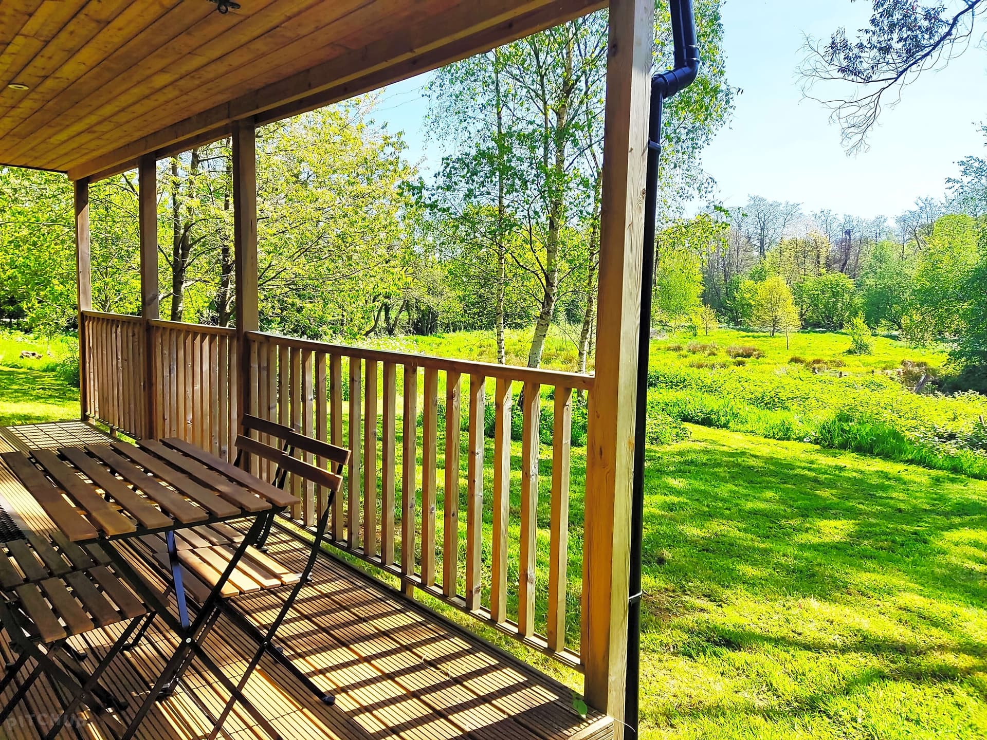 Sunny veranda with views across the grounds